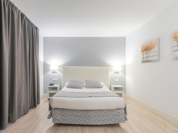 Soho Boutique Los Naranjos : photo 2 de la chambre chambre familiale (2 adultes et 2 enfants)