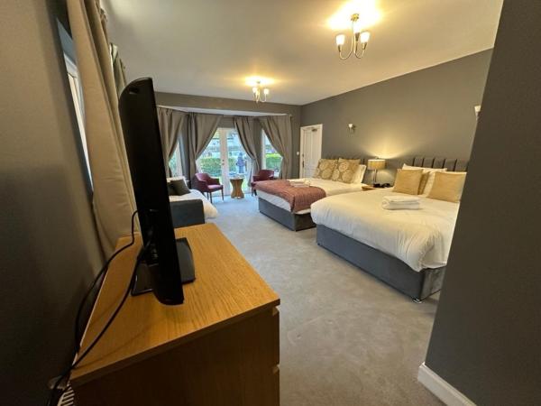 Kildonan Lodge Hotel : photo 4 de la chambre chambre familiale - vue sur jardin