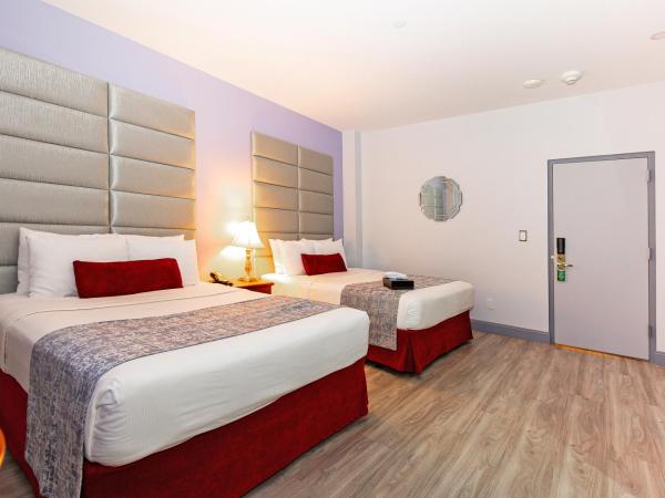 Hotel St. James : photo 3 de la chambre chambre avec 2 lits doubles - accessible aux personnes à mobilité réduite
