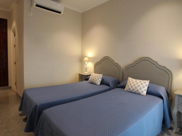 Hotel Maestranza : photo 6 de la chambre chambre double ou lits jumeaux