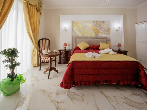 REDDIMUS Guest House : photo 1 de la chambre suite avec baignoire spa