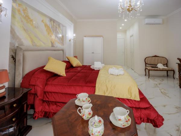 REDDIMUS Guest House : photo 2 de la chambre suite avec baignoire spa