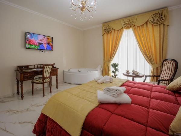 REDDIMUS Guest House : photo 3 de la chambre suite avec baignoire spa