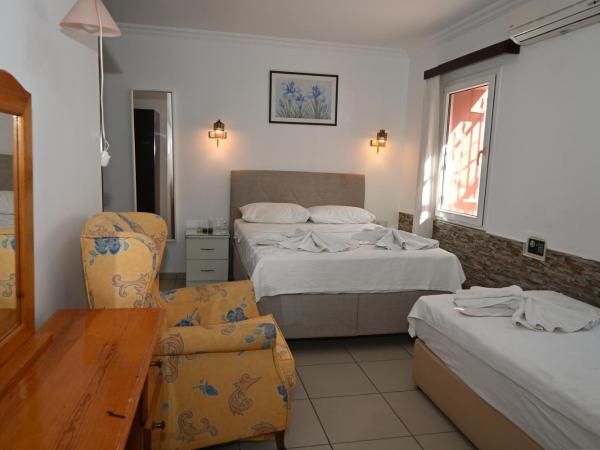 Melis Pansiyon : photo 4 de la chambre chambre triple standard