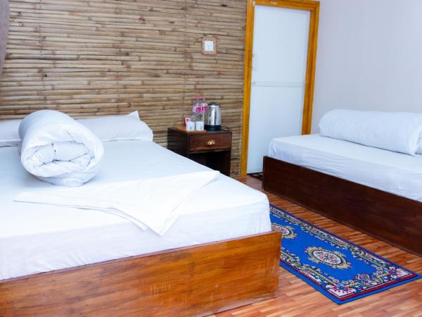 Naya Gaun Eco Resort : photo 2 de la chambre chambre double ou lits jumeaux avec salle de bains privative
