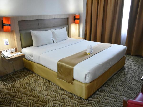 Abadi Hotel Malioboro Yogyakarta by Tritama Hospitality : photo 1 de la chambre chambre double ou lits jumeaux affaires 