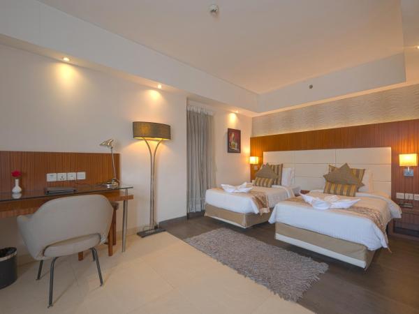Celesta - Kolkata : photo 3 de la chambre chambre double ou lits jumeaux supérieure avec vue sur ville