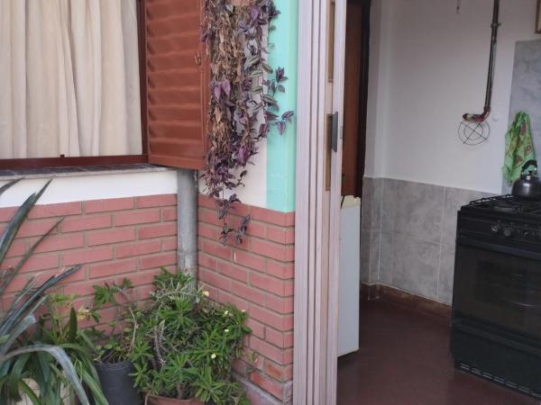 Lo de Su : photo 7 de la chambre chambre triple avec salle de bains commune