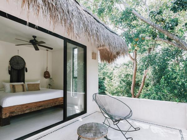 Una Vida : photo 1 de la chambre chambre tropicale avec terrasse