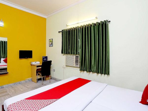 Honey Regency Near City Centre Salt Lake : photo 7 de la chambre chambre double standard