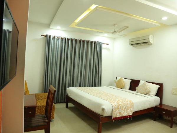 Malabar Plaza INN : photo 1 de la chambre chambre deluxe