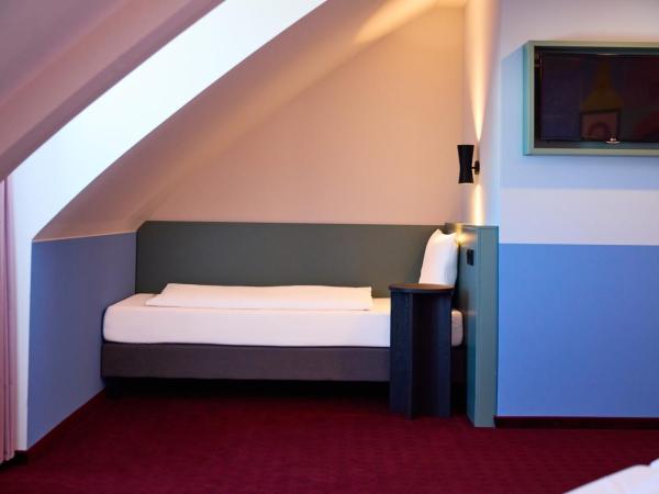 McDreams Hotel Leipzig : photo 6 de la chambre chambre quadruple