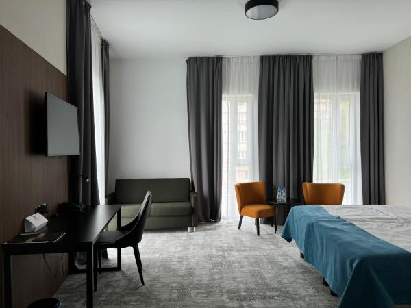 Focus Hotel Premium Lublin : photo 1 de la chambre chambre double familiale