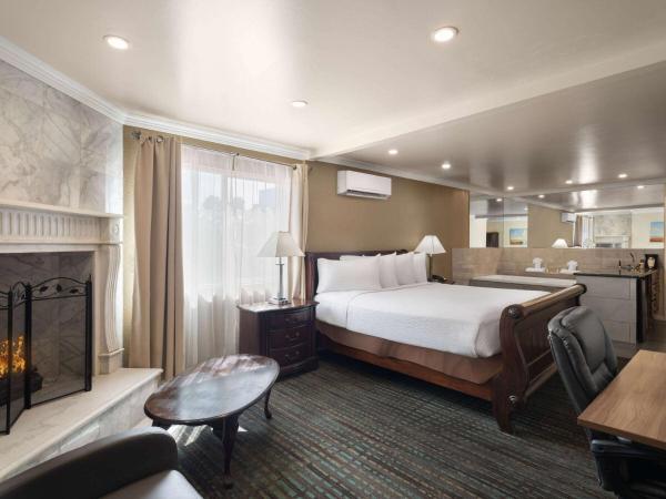 Days Inn by Wyndham Las Vegas Airport Near the Strip : photo 1 de la chambre suite studio lit king-size - non-fumeurs