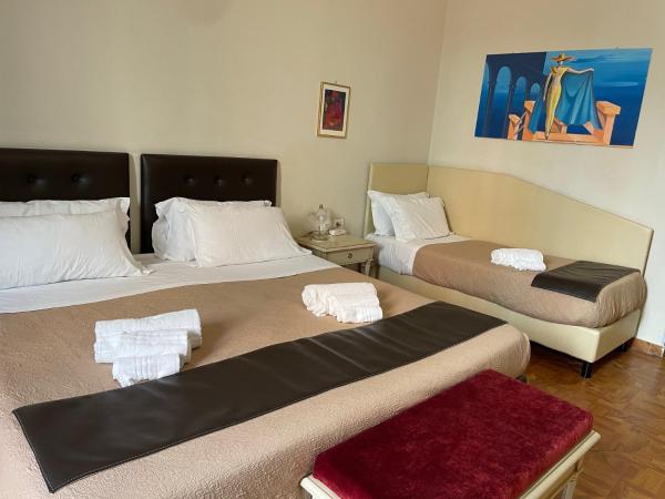 Umberto House Catania : photo 1 de la chambre chambre quadruple standard