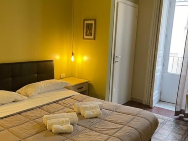 Umberto House Catania : photo 7 de la chambre chambre triple confort