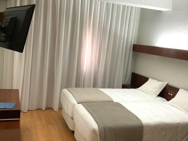 Hotel Costa de Prata 2 & Spa : photo 1 de la chambre chambre lits jumeaux