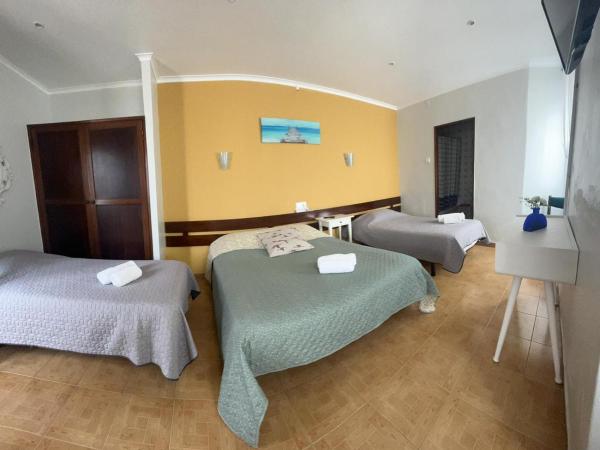 Residência Aviz : photo 4 de la chambre chambre quadruple avec salle de bains privative