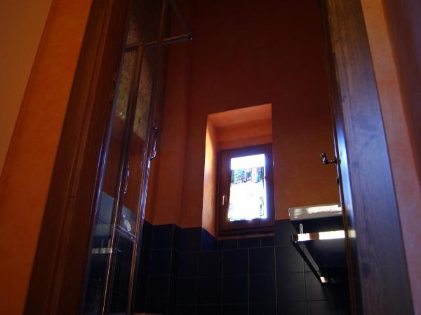 Al Canto B&B : photo 5 de la chambre chambre double ou lits jumeaux - vue sur jardin