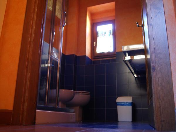 Al Canto B&B : photo 6 de la chambre chambre double ou lits jumeaux - vue sur jardin