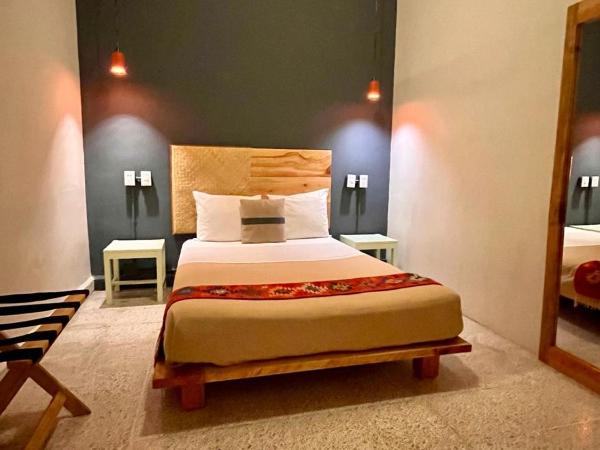 Selina Oaxaca : photo 1 de la chambre petite chambre avec salle de bains commune 