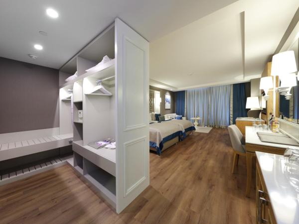 Sueno Hotels Deluxe Belek : photo 5 de la chambre chambre de luxe - vue sur terres et golf