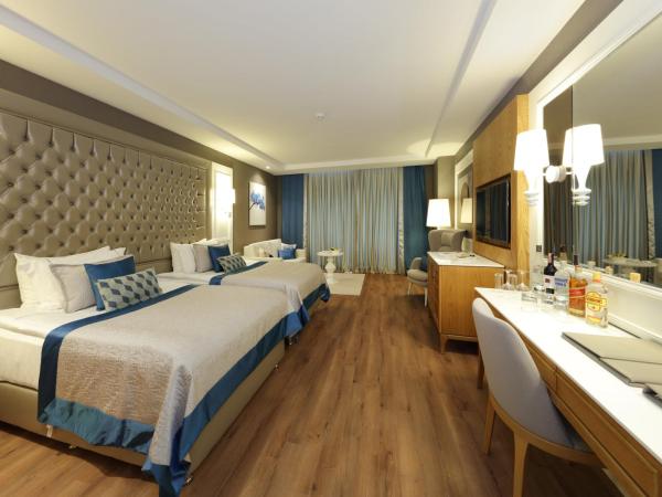 Sueno Hotels Deluxe Belek : photo 3 de la chambre chambre de luxe - vue sur terres et golf