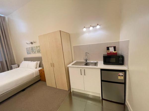Grand Central Serviced Apartments : photo 4 de la chambre studio lit king-size