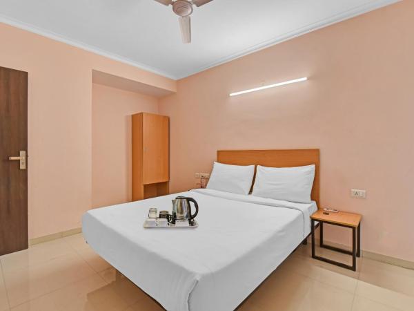 Collection O oyo townhouse : photo 6 de la chambre chambre triple classique