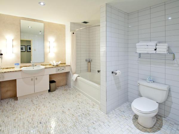 Le Square Phillips Hôtel & Suites : photo 5 de la chambre suite loft avec 2 lits queen-size