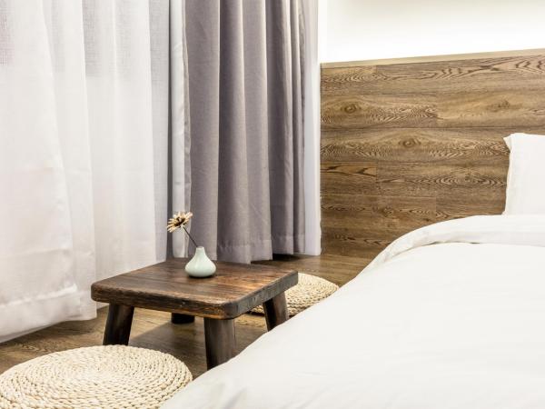 1Forest Hostel Shanghai Tongji University Siping Road Metro Station : photo 2 de la chambre chambre lits jumeaux deluxe