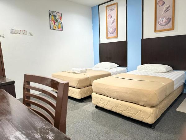 Shangg INN : photo 5 de la chambre chambre lits jumeaux deluxe