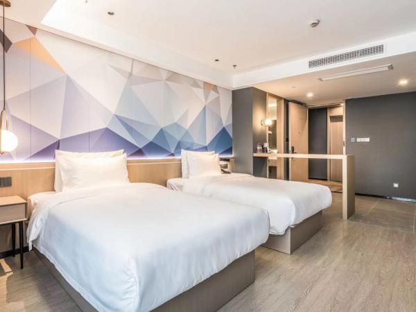 Veegle By Landison Ningbo : photo 1 de la chambre chambre lits jumeaux deluxe