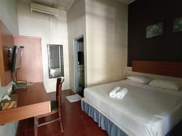 Ndalem Mantrigawen : photo 2 de la chambre chambre double standard