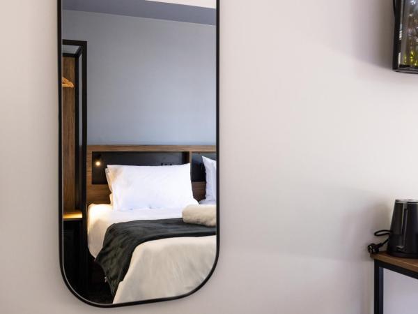 Haka House Rotorua : photo 3 de la chambre chambre lits jumeaux