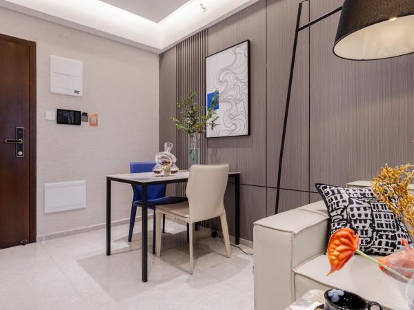 Excellence International Apartment - Convention & Exhibition Center : photo 6 de la chambre chambre supérieure lit queen-size