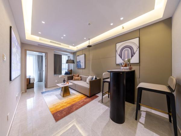 Excellence International Apartment - Convention & Exhibition Center : photo 2 de la chambre light luxury audio-visual one-bedroom and one-bathroom [72-inch projection + tencent membership + large refrigerator + washing machine