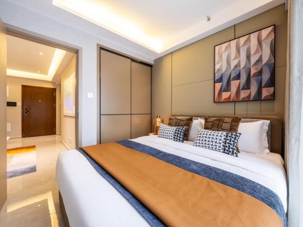 Excellence International Apartment - Convention & Exhibition Center : photo 8 de la chambre light luxury audio-visual one-bedroom and one-bathroom [72-inch projection + tencent membership + large refrigerator + washing machine