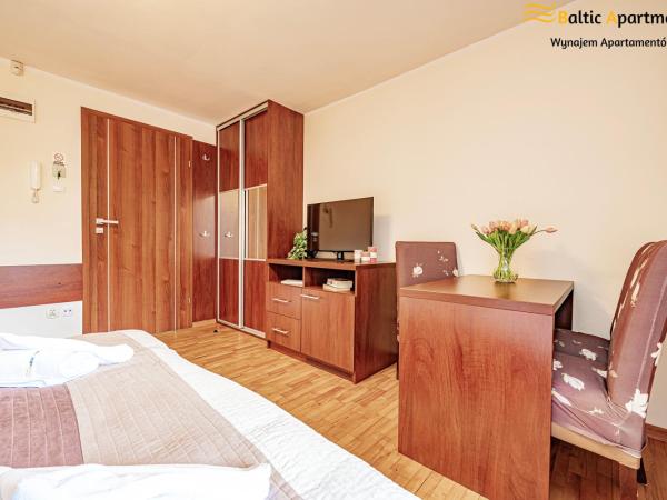 Baltic Apartments - Hotelik Przy Promenadzie : photo 8 de la chambre appartement familial 2 chambres avec terrasse