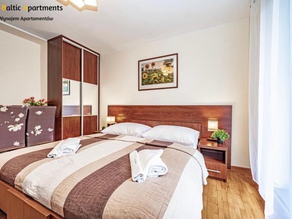 Baltic Apartments - Hotelik Przy Promenadzie : photo 5 de la chambre appartement familial 2 chambres avec terrasse