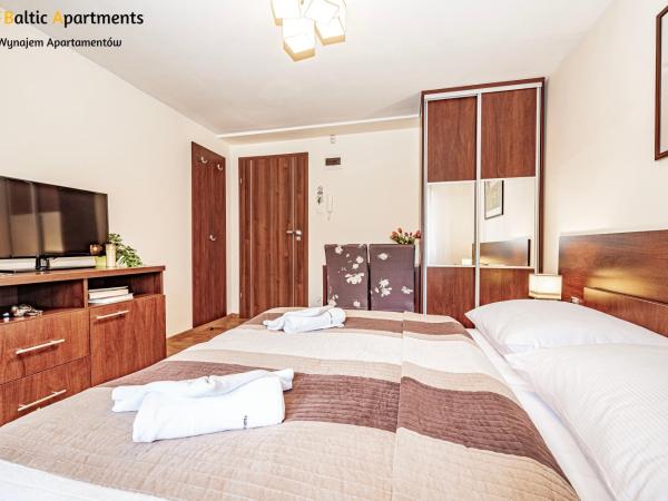 Baltic Apartments - Hotelik Przy Promenadzie : photo 4 de la chambre appartement familial 2 chambres avec terrasse