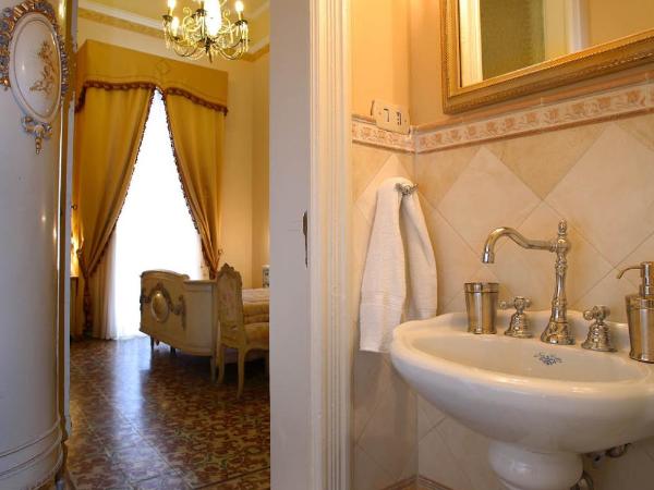 B&B Il Caravaggio : photo 5 de la chambre chambre triple avec salle de bains privative