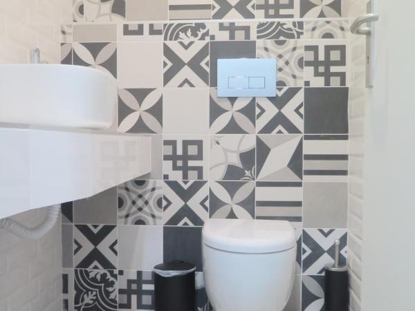 Penedo da Saudade Suites & Hostel : photo 4 de la chambre chambre familiale avec salle de bains