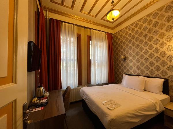Le Safran Suite Hotel : photo 1 de la chambre petite chambre double