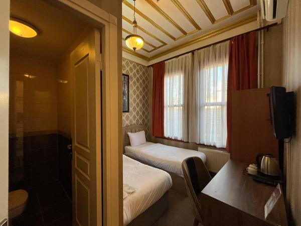 Le Safran Suite Hotel : photo 1 de la chambre chambre lits jumeaux standard