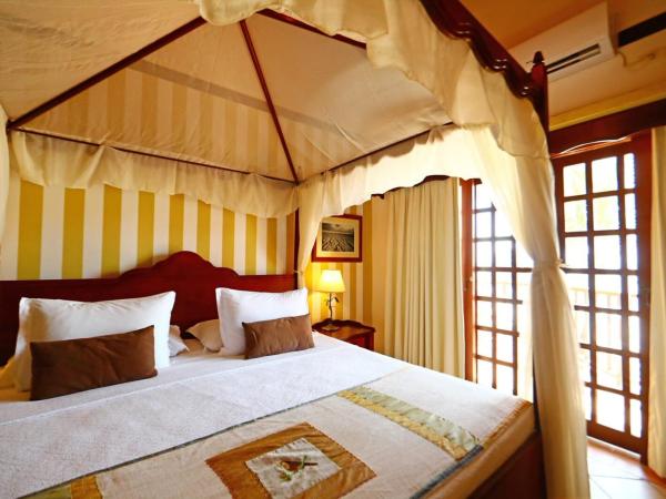 Manary Praia Hotel : photo 2 de la chambre chambre double deluxe - vue latérale sur mer