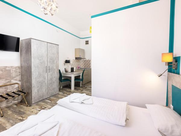 Amber Terrace Studios Downtown : photo 5 de la chambre petit studio