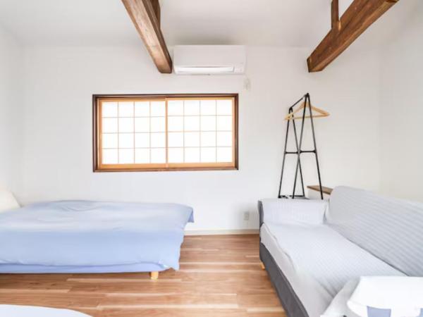 Hostel Ayame : photo 3 de la chambre chambre lits jumeaux standard avec vue sur jardin