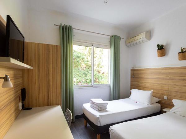 L'Oasis Hotel : photo 2 de la chambre chambre lits jumeaux Économique