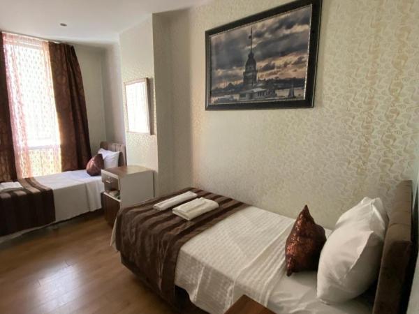 GARDEN HILL HOTEL : photo 4 de la chambre chambre double ou lits jumeaux deluxe - vue sur ville